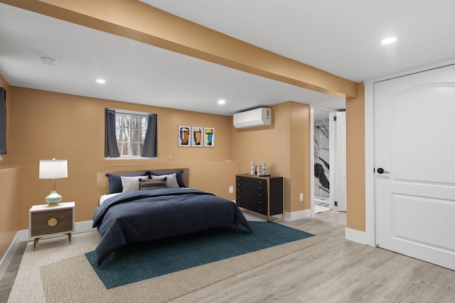13 Ripley Rd, Patterson, NY 12563 - bedroom with a wall unit AC, light wood finished floors, and recessed lighting