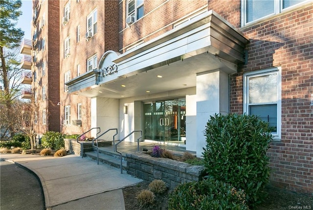 1133 Midland Ave Unit 4C, Bronxville, NY 10708 - entrance to property featuring brick siding and cooling unit
