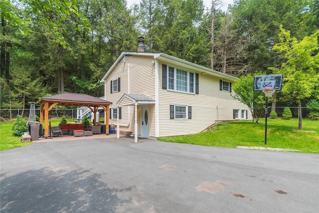 65 Berkshire Trl, Smallwood, NY 12720 - view of front of home featuring an outdoor living space, a gazebo, a patio, asphalt driveway, and a carport
