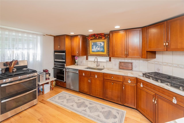 65 Berkshire Trl, Smallwood, NY 12720 - kitchen featuring stainless steel appliances, brown cabinetry, light countertops, and recessed lighting