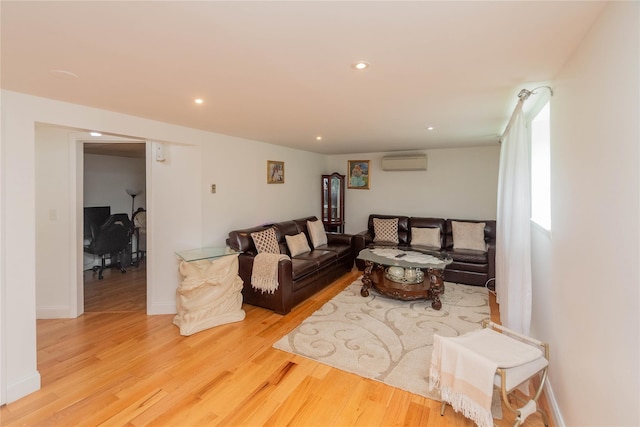 65 Berkshire Trl, Smallwood, NY 12720 - living area with a wall mounted air conditioner, light wood-style flooring, and recessed lighting