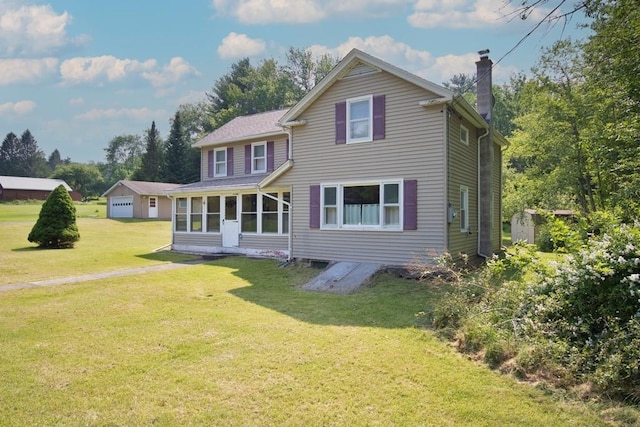 169 Mitchell Pond Rd E, Cochecton, NY 12726 - view of front of property featuring a chimney, an outdoor structure, a front yard, a garage, and a sunroom