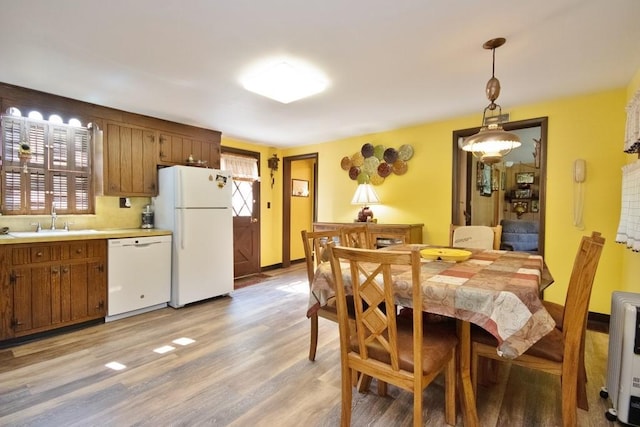 169 Mitchell Pond Rd E, Cochecton, NY 12726 - dining space with light wood-type flooring, healthy amount of natural light, and heating unit