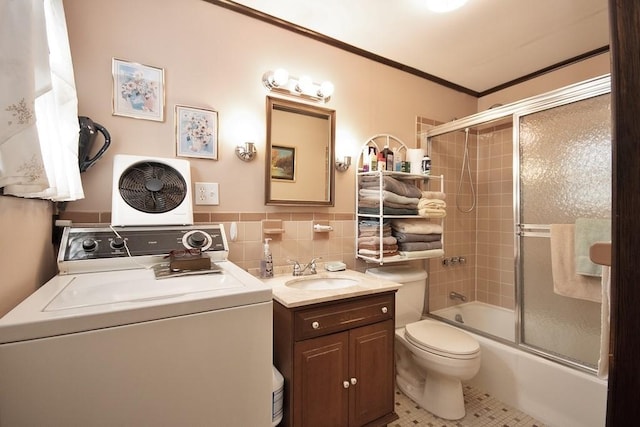 169 Mitchell Pond Rd E, Cochecton, NY 12726 - full bath featuring washer / clothes dryer, vanity, shower / bath combination with glass door, ornamental molding, and tile patterned floors