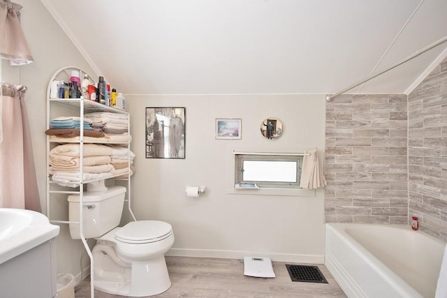 169 Mitchell Pond Rd E, Cochecton, NY 12726 - full bathroom featuring wood finished floors, vanity, vaulted ceiling, and shower / washtub combination