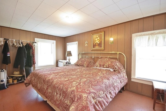 169 Mitchell Pond Rd E, Cochecton, NY 12726 - bedroom with carpet flooring and wood walls