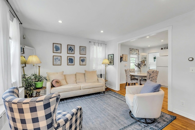 15 Robbins Ave, Islip, NY 11751 - living area with wood finished floors and recessed lighting