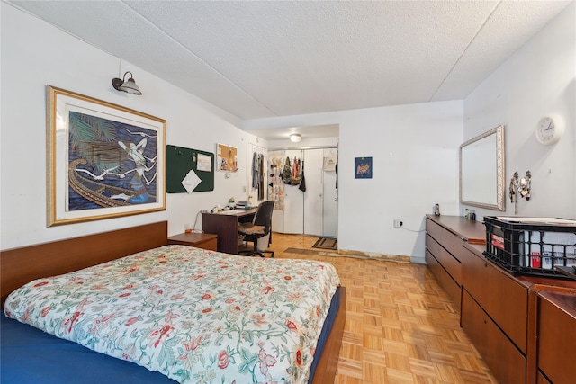 1901 Madison Ave Unit 105, New York Manhattan, NY 10035 - bedroom with a textured ceiling and a closet