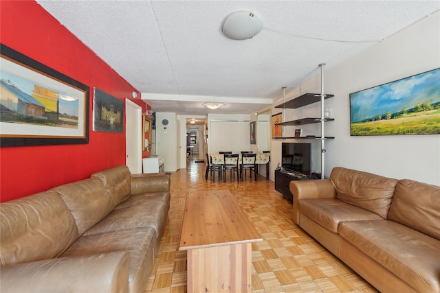 1901 Madison Ave Unit 105, New York Manhattan, NY 10035 - living area featuring a textured ceiling