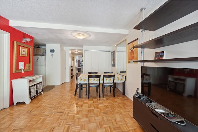 1901 Madison Ave Unit 105, New York Manhattan, NY 10035 - dining room featuring a textured ceiling