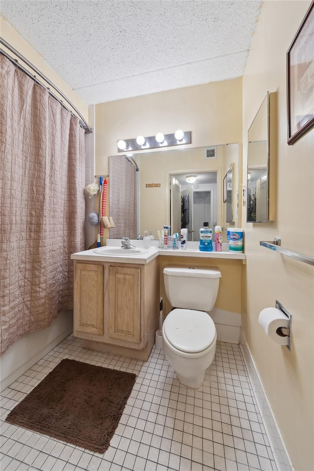1901 Madison Ave Unit 105, New York Manhattan, NY 10035 - full bathroom featuring tile patterned flooring, shower / bath combo with shower curtain, and vanity