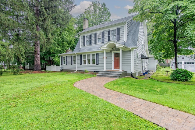 16 Beechwood Park, Poughkeepsie, NY 12601 - view of front of house featuring a chimney, roof with shingles, and a gambrel roof