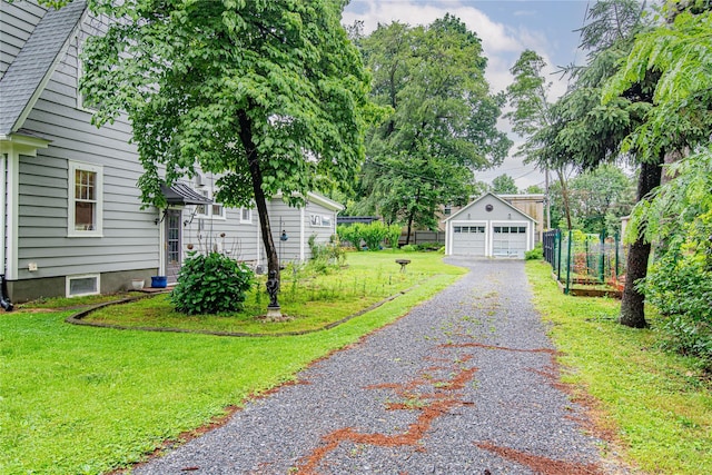 16 Beechwood Park, Poughkeepsie, NY 12601 - view of yard featuring an outbuilding and a detached garage