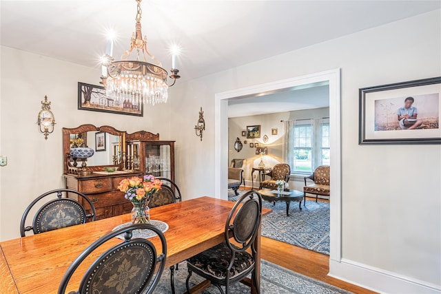 16 Beechwood Park, Poughkeepsie, NY 12601 - dining area featuring wood finished floors and a chandelier