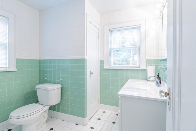 16 Beechwood Park, Poughkeepsie, NY 12601 - bathroom with tile walls, vanity, tile patterned flooring, and healthy amount of natural light