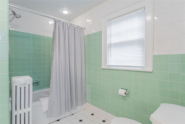 16 Beechwood Park, Poughkeepsie, NY 12601 - bathroom featuring radiator, tile patterned floors, shower / tub combo, and tile walls