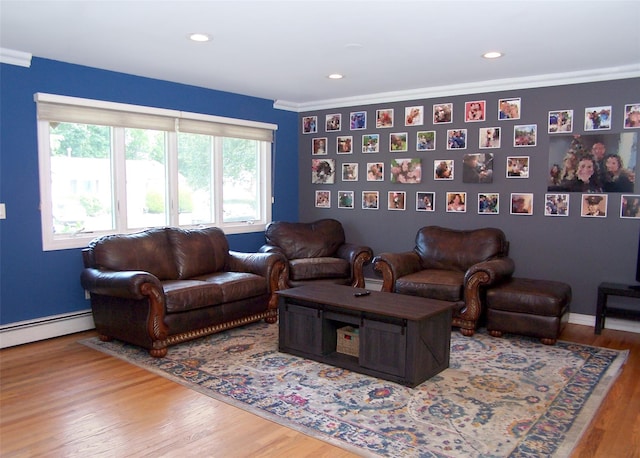 4 Bowman Ln, Commack, NY 11725 - living area featuring wood finished floors, baseboard heating, crown molding, and recessed lighting