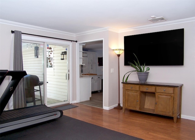 4 Bowman Ln, Commack, NY 11725 - exercise room with wood finished floors and ornamental molding