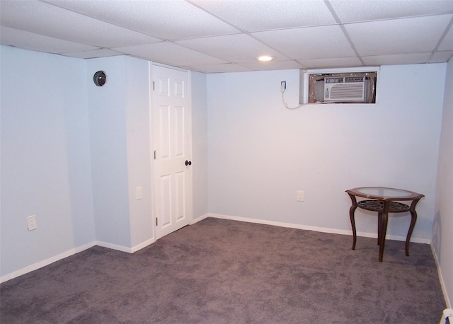 4 Bowman Ln, Commack, NY 11725 - finished below grade area featuring carpet flooring, a paneled ceiling, an AC wall unit, and recessed lighting
