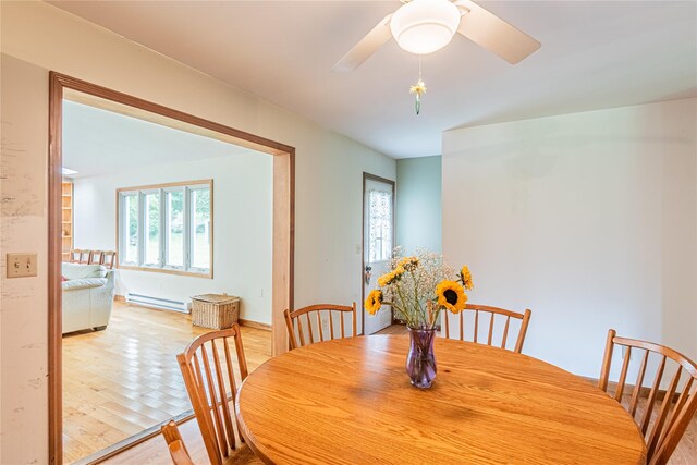 2136 Rte 55, Lagrangeville, NY 12540 - dining space with a baseboard radiator, wood finished floors, and ceiling fan