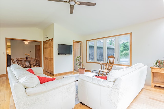 2136 Rte 55, Lagrangeville, NY 12540 - living room featuring a ceiling fan, vaulted ceiling, and light wood finished floors