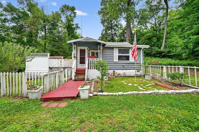 9 Mimosa St, Lake Peekskill, NY 10537 - view of front of home featuring a wooden deck