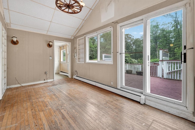 9 Mimosa St, Lake Peekskill, NY 10537 - unfurnished sunroom featuring a baseboard radiator and lofted ceiling