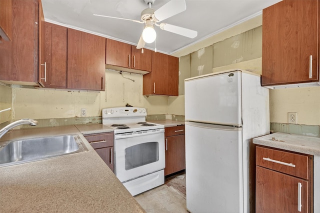 9 Mimosa St, Lake Peekskill, NY 10537 - kitchen featuring white appliances, a ceiling fan, light countertops, and brown cabinetry