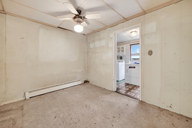 9 Mimosa St, Lake Peekskill, NY 10537 - carpeted spare room with baseboard heating, washer / dryer, and a ceiling fan