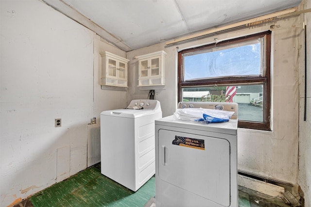 9 Mimosa St, Lake Peekskill, NY 10537 - laundry room with washer and dryer and dark flooring