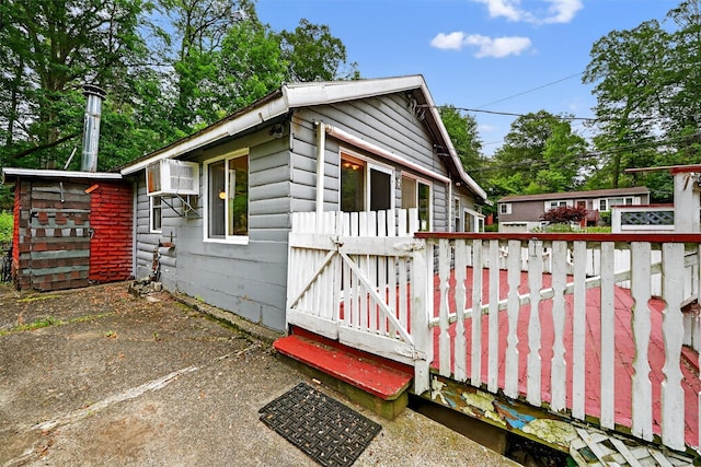 9 Mimosa St, Lake Peekskill, NY 10537 - view of side of property featuring a wall unit AC