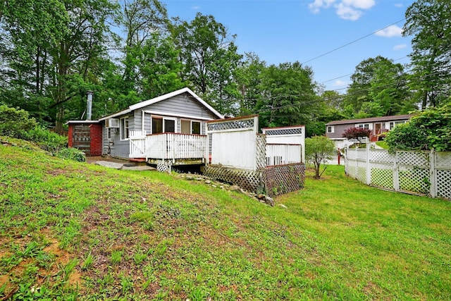 9 Mimosa St, Lake Peekskill, NY 10537 - rear view of property featuring a deck