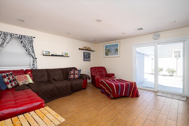 755 E Chester St, Long Beach, NY 11561 - living room with light wood-type flooring and recessed lighting