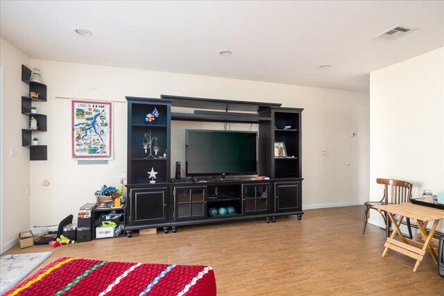 755 E Chester St, Long Beach, NY 11561 - living area with wood finished floors and recessed lighting