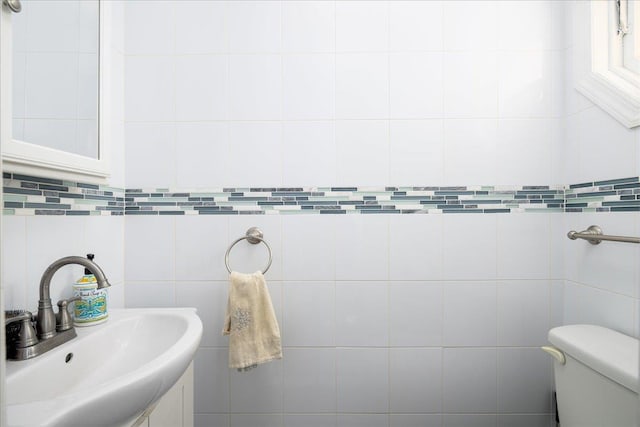 755 E Chester St, Long Beach, NY 11561 - half bathroom with a sink and tile walls