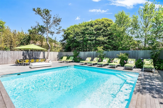 172 Pine Walk, Fire Island Pines, NY 11782 - view of pool with a fenced backyard and a wooden deck