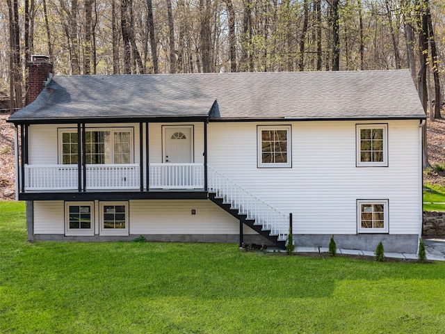 48 Lockwood Rd, South Salem, NY 10590 - view of front of home featuring stairs, a front lawn, and a chimney