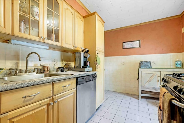 4911 168th St, Flushing, NY 11365 - kitchen with stainless steel appliances, tile walls, light tile patterned floors, light brown cabinets, and light countertops