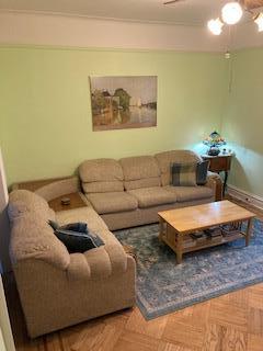 5855 41st Dr, Woodside, NY 11377 - living area with baseboards