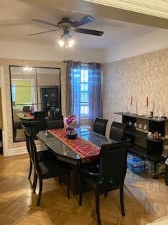 5855 41st Dr, Woodside, NY 11377 - dining room with ceiling fan