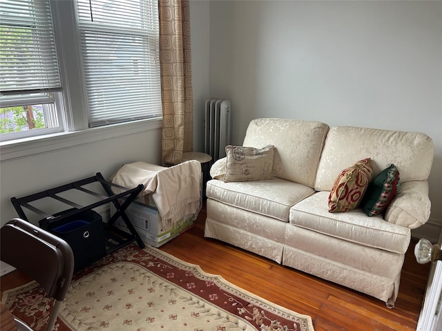 5855 41st Dr, Woodside, NY 11377 - sitting room featuring radiator and wood finished floors