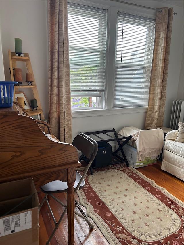 5855 41st Dr, Woodside, NY 11377 - office with radiator heating unit and wood finished floors