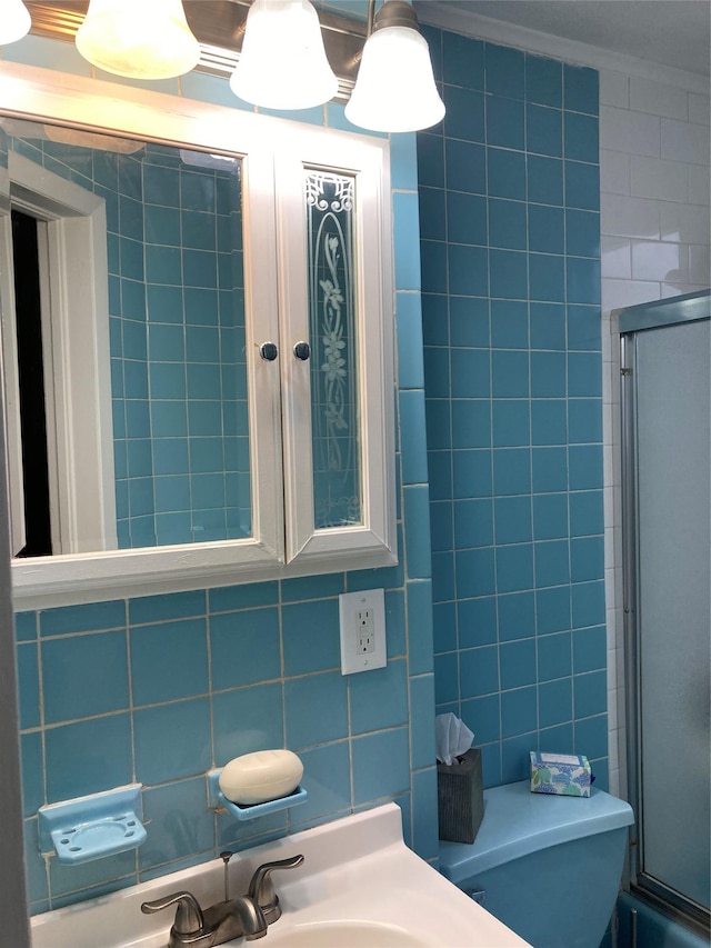 5855 41st Dr, Woodside, NY 11377 - full bathroom featuring an enclosed shower, tile walls, backsplash, and vanity