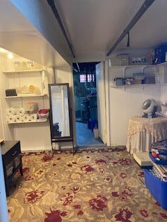 5855 41st Dr, Woodside, NY 11377 - finished basement featuring carpet flooring