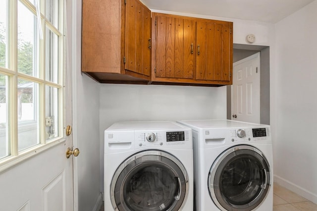 32 Illinois St, Dix Hills, NY 11746 - laundry area with cabinet space, washer and dryer, and light tile patterned flooring