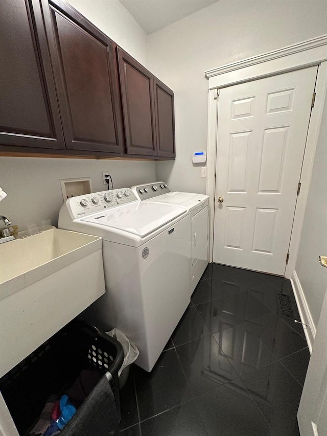 133 Woodbrook Rd, White Plains, NY 10605 - washroom with separate washer and dryer, cabinet space, and granite floors