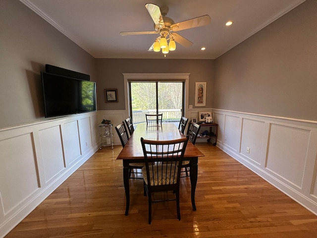 133 Woodbrook Rd, White Plains, NY 10605 - dining space with a decorative wall, wood finished floors, wainscoting, a ceiling fan, and recessed lighting