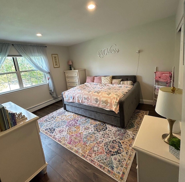 43 Southfield Rd, Baiting Hollow, NY 11933 - bedroom featuring baseboard heating, dark wood-style floors, and recessed lighting