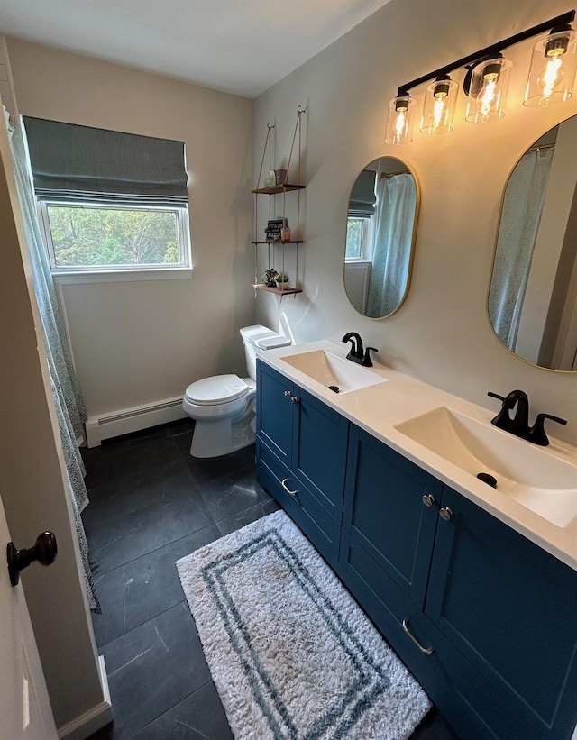 43 Southfield Rd, Baiting Hollow, NY 11933 - bathroom featuring baseboard heating and double vanity