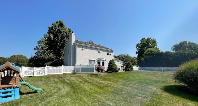 43 Southfield Rd, Baiting Hollow, NY 11933 - fenced backyard with a playground